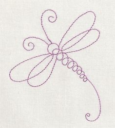 an embroidered dragonfly is shown on a white fabric