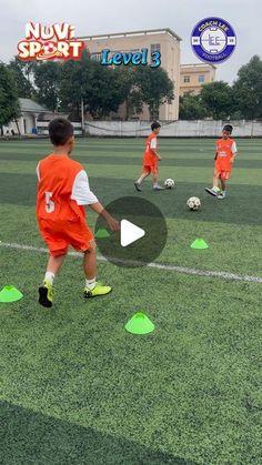 children are playing soccer on the field with green cones in front of them and an ad for nuv sport level 5