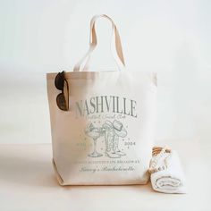 a tote bag sitting on top of a white table