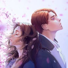 two people standing next to each other with flowers in the air behind them and one person looking up at the sky