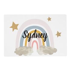 a card with the word sydney on it, and clouds in front of a rainbow