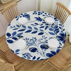 a blue and white table with plates on it