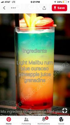 a colorful drink with an apple in it