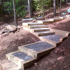 the steps are made out of wood and gravel