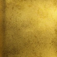 an image of a yellow background that looks like it has some dirt on the ground