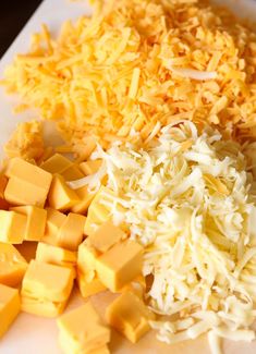 the cheese is cut up and ready to be eaten