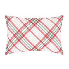 a red and green plaid pillow on a white background