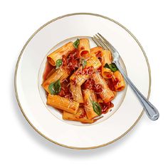 a white plate topped with pasta and sauce next to a fork on top of a table