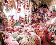 a room filled with lots of stuffed animals