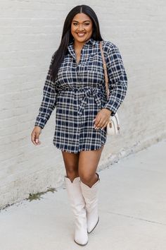 Details Navy plaid shirt dress Fabric has no stretch, relaxed fit Collared with button down closure, self tying belted waist, long sleeves, and rounded hem Pair this cute dress with the Boujee cream purse and matching dress for your mini! Unlined Size small from shoulder to hem: 33" Material and Care 70% polyester, 30% cotton Hand wash, dry flat Patterns may vary Materials may have natural variations Colors may vary from different viewing devices. Plaid Long Sleeve Shirt Dress With Buttons, Fitted Plaid Button-up Dress, Plaid Button-up Dress For Daywear, Cream Purse, Plaid Shirt Dress, Plaid Cotton Button-up Dress, Cocktail Dress Wedding Guest, Midi Bridesmaid Dress, Plaid Cotton Button-up Shirt Dress