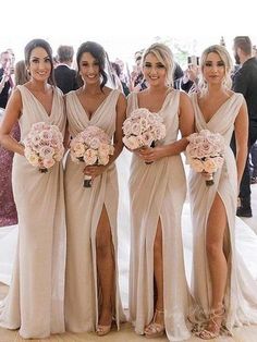 the bridesmaids are all dressed in different styles of gowns and bouquets