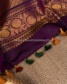 Navratri Banarasi Silk Sets With Latkans, Elegant Saree With Latkans For Festive Occasions, Elegant Festive Saree With Latkans, Navratri Banarasi Silk Blouse With Latkans, Festive Banarasi Silk Set With Latkans, Elegant Wedding Saree With Latkans, Semi-stitched Saree With Latkans, Art Silk Blouse Piece With Latkans For Festivals, Art Silk Saree With Latkans For Festivals