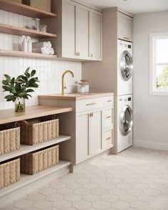 a washer and dryer in a white kitchen