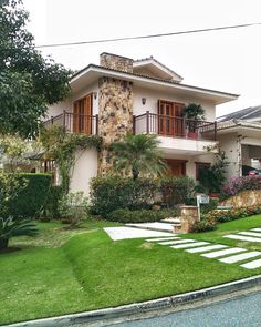 a house with landscaping in the front yard