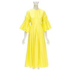 ROKSANDA sunshine yellow cotton origami pleat flared sleeves A-line dress UK6 XS Reference: AAWC/A00193 Brand: Roksanda Material: Cotton Color: Yellow Pattern: Solid Closure: Zip Extra Details: Side side seam pockets Made in: China CONDITION: Condition: Excellent, this item was pre-owned and is in excellent condition. SIZING Designer size: UK6 Size reference: US0 / UK6 / IT38 / FR34 / XXS-XS MEASUREMENTS: Shoulder to shoulder: 55cm / 21.5" Chest: 40cm / 15.6" Waist: 33cm / 12.9" Hip: 45cm / 17.6" Length: 129cm / 50.3" Sleeve length: 29cm / 11.3" This Roksanda item is authentic. Sunshine Yellow, Yellow Pattern, Eco Fashion, Flared Sleeves, Favorite Color, A Line Dress, Origami, Evening Dresses, A Line