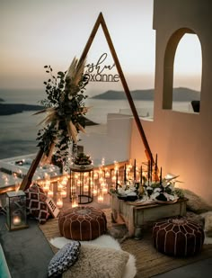 an outdoor area with candles and decorations