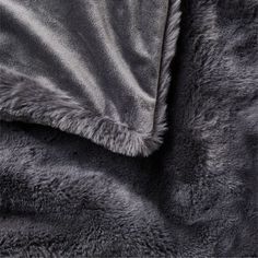 a blanket that has been made with grey fur