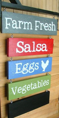 a sign that says farm fresh, salsa, eggs, vegetables and salas on it