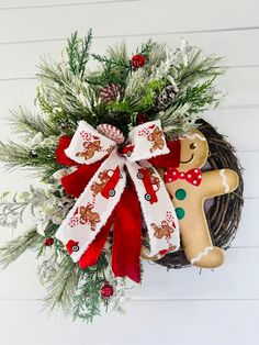 a christmas wreath with a gingerbread man on it