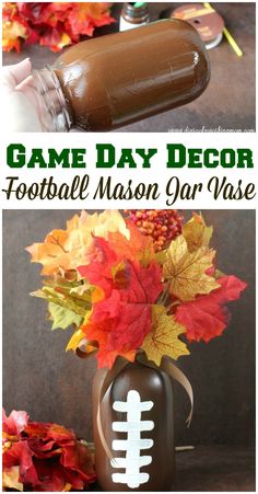 the football mason jar vase is decorated with fall leaves, and has a football on it