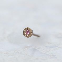 SINGLE STUDS made to mix and match. Hexagon stud, set with a pink sapphire. Earrings measure 3.5mm Weight 0.3g (approximately) Please note this is for one earring, to order a pair, add two at checkout. Pink Octagon Diamond Jewelry, Pink Sapphire Earrings, One Earring, Ear Party, Tiny Studs, Stud Set, Sapphire Earrings, Instagram Icons, Pink Sapphire