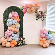 balloons are arranged in the shape of letters and flowers