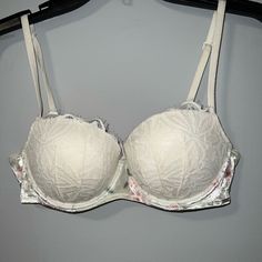 Never Worn. Perfect Condition. White Lace With Velvet Strap. Push Up Bra With Underwire. White Underwire Bra With Lace Trim, White Feminine Bra With Lace Trim, White Fitted Feminine Bra, Feminine White Underwire Bra, Victoria's Secret White Padded Bra, White Stretch Bra Partially Lined, Fitted White Bra With Lace Trim, White Fitted Underwire Bra, White Feminine Bra With Lined Body