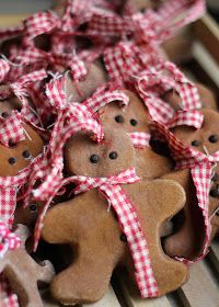 some brown teddy bears with red and white checkered bows