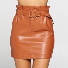 Brown Faux Leather Skirt Never Worn. Nwot Fitted Brown Faux Leather Mini Skirt, Brown High Waist Mini Skirt For Party, High Waist Brown Mini Skirt For Party, Chic Brown Skirt For Night Out, Brown Faux Leather Mini Skirt For Party, Fall Faux Leather Skirt With Belt Loops, Brown Faux Leather Skirt For Party, Chic Brown Leather Mini Skirt, Party Faux Leather Brown Mini Skirt