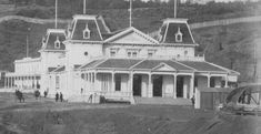 an old black and white photo of a large building