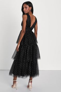 If you're dressing to impress at your next event, let the Lulus Decadent Impression Black Tulle Tiered Shiny Dot Midi Dress be your solution! Airy tulle features shiny reflective accents in rose gold and silver as it shapes a sleeveless bodice with a plunging V-neckline, matching V-back, and banded waist. Voluminous skirt has an A-line silhouette and falls in floaty tiers (with extra tulle for volume) to a long midi hem. Hidden zipper/clasp at back. Fit: This garment fits true to size. Length: M Tiered Sequin Evening Dress, Tiered Sequin Dress For Evening, Polka Dot Ruffled Evening Dress, Polka Dot Sleeveless Evening Dress, Polka Dot Ruffled Dress For Evening, Polka Dot Ruffle Dress For Evening, Sleeveless Polka Dot Midi Dress For Evening, Polka Dot Midi Length Evening Dress, Polka Dot Midi-length Evening Dress