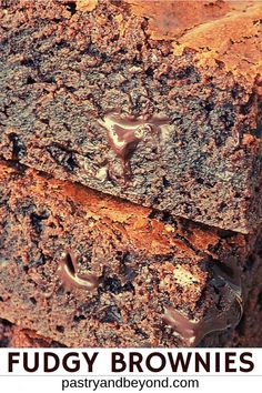 chocolate fudge brownies stacked on top of each other with text overlay that reads fudge brownies