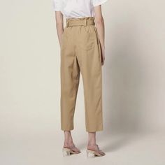 Sandro Women’s Pants Belted High-Waisted Pants 100% Cotton Loose Fit Topstitching On The Waistband Sandro Logo Engraved On The Buckle Of The Belt Pleats At The Waist Two Slanted Pockets On The Front And Two Patch Pockets On The Back Model Is Wearing A Size 36/Uk 8/Us 26 Inseam Lenght: 37.5" Inseam Lenght: 25" Reference : P6517e Main Fabric: 100% Cotton Buckle: 100% Zamac Belt Lining: 100% Cotton Pocket Lining: 100% Cotton Tapered Summer Bottoms With Belt Loops, Spring Tapered Bottoms With Belt Loops, Elegant Belted Cotton Pants, Fitted Bottoms With Belt Loops For Daywear, Beige Straight Leg Belted Pants, Belted Straight Leg Beige Pants, Beige Belted Straight Leg Pants, Spring Tapered Pants For Workwear, Spring Tapered Workwear Pants