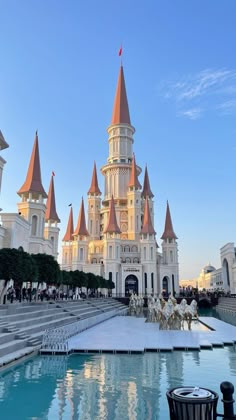 a large castle like building with many spires