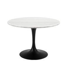 an oval marble table with black base