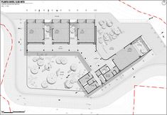 an architectural drawing shows the ground plan for a building with multiple floors and various seating areas