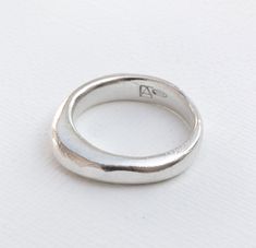 I want great design to be accessible to everyone.  This ring was hand carved in wax, casted into silver, and hammered by me in Phoenix, AZ. Because of this process, every ring is slightly different. This is a organic shaped sterling silver ring that has a hammer texture. Each ring is different, just like its owner. The general dimension of this ring are a width of ~4-5mm, with the highness part of the ring measuring ~4mm and the thinnest being 1.5mm. I offer a lifetime craftsmanship warranty on all of my pieces. Available in gold or other metals, just send me a message. Check out my other work at https://www.etsy.com/shop/EvelynArmine?ref=seller-platform-mcnav Follow me @evelynarminedesigns on instagram for more photos and updates on what is happening in my shop! Wax Carved Ring, Accessory Inspo, Edgy Jewelry, Wax Carving, Carved Ring, Hammered Band, Hammered Silver, Phoenix Az, Organic Shapes