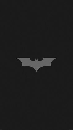 the dark knight rises batman logo on a black background, with only one bat visible