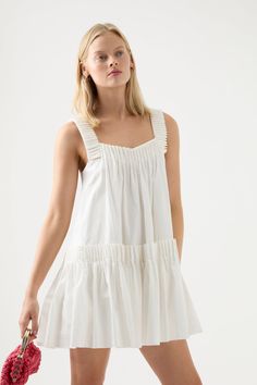 Shop the Orbit Sculptural Pleated Top in Ivory online at Aje. Free Express Shipping available in Australia Over $150. Easy and fuss-free returns. White A-line Mini Dress With Ruffle Hem, Chic White A-line Sundress, Chic Mini Dress With Pleated Hem For Daywear, White Smocked Mini Dress For The Beach, White Mini Smocked Dress For Beach, White Pleated Dress For Daywear, Off White Ruffled Midi Dress For Daywear, Chic White Mini Sundress, White Cotton Mini Dress With Ruffles