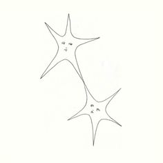 two starfishs are shown in black and white, one has its eyes open