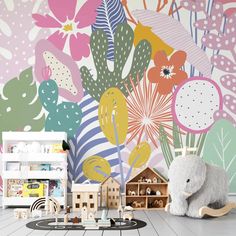 a child's room with colorful wallpaper and toys