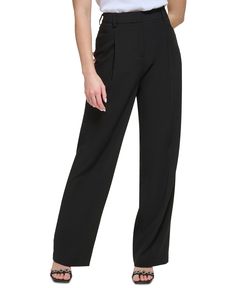 A pleated front lends stylish structure to these women's pants from Calvin Klein, a chic transition piece for the office and beyond. Approx. inseam: 32" Approx. 11-1/4"; wide-leg Zipper with hook-and-bar closure at front Slant pockets at hips Rayon, polyester, spandex Dry clean Imported High Waist Wide Leg Pants, Pants Collection, 50 Style, Calvin Klein Woman, Waist Measurement, Matching Family Outfits, Sleeves (women), Pocket Pants, Family Outfits