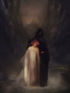 a man and woman standing next to each other in front of a dark, foggy background