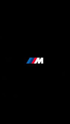 the bmw logo is shown on a black background with red, white and blue stripes