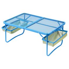 a blue coffee table with two trays underneath it