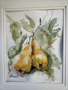 watercolor painting of two pears with green leaves on white paper framed in white frame