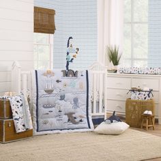 a baby crib bedding set with an ocean theme