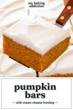 a piece of pumpkin bars with cream cheese frosting is being held by a spatula