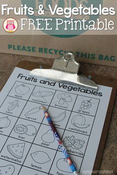 a free printable fruit and veggie game for kids to play on the table