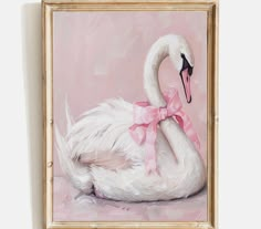 a painting of a white swan with a pink bow